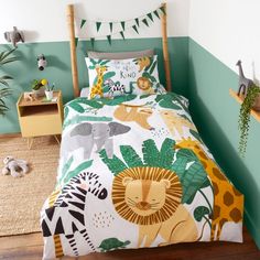 a bed room with a neatly made bed and animal themed comforter sets on it