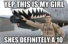 a man in uniform standing next to an airplane with the caption yep this is my girl she's definitely a 10