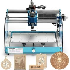 an image of a machine that is being used to make christmas ornaments and other decorations