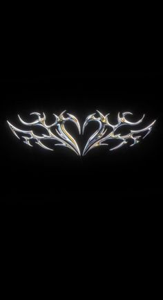 an artistic design in the shape of a heart on a black background with light effects