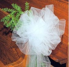 a bride's bouquet is sitting on a chair