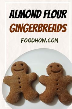 two gingerbreads on a white plate with the words almond floured sugar cookies