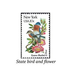 a stamp with two birds on it and the words state bird and flower written below