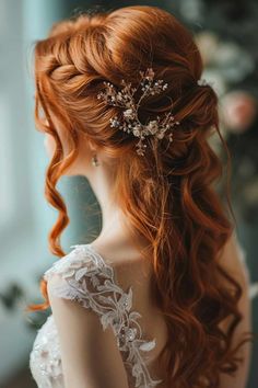 a woman with long red hair wearing a wedding dress and a flower in her hair