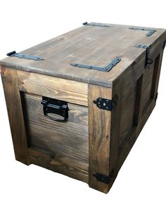 a large wooden box with metal handles and latches on the lid is shown in front of a white background