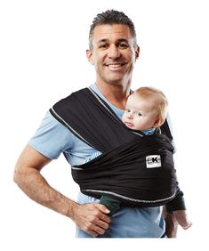 a man holding a baby in a sling