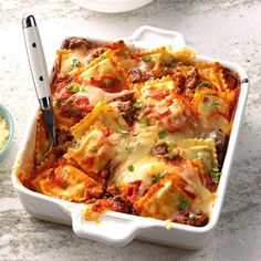 a casserole dish with meat and cheese