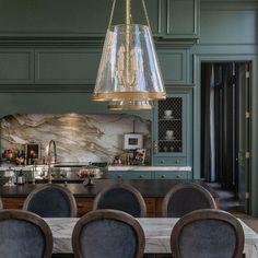 Featuring a blend of colors, metals, materials, and textures this kitchen is one of our favorites. Design and build by Cambridge Home Company, photo by Sara McArthur-Pierce Scout And Nimble, Company Photo, Cambridge House, Materials And Textures, Dining Room Decor, Table And Chairs