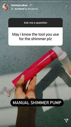 a person holding a red and white object in their hand with the caption, may i know the tool you use for the shimer piz manual