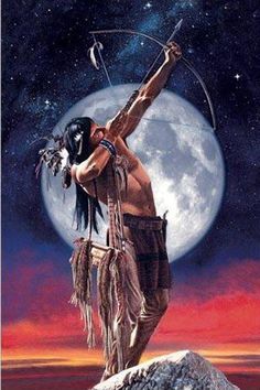 a native american man standing on top of a rock with an arrow in his hand