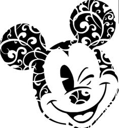 mickey mouse head with swirly ears on it's face and the word disney written in