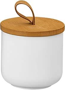 a wooden lid on a white container