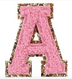 the letters are made out of pink and gold glitters, with an upper letter in the