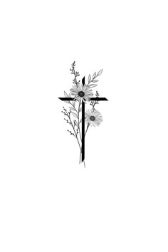 a cross and some flowers on a white background