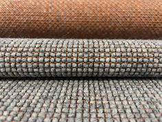 close up view of the fabric textured with orange and grey colors