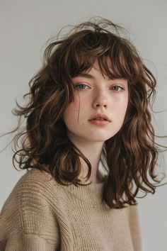 19 Natural Wavy Haircuts That Celebrate Your Curves - Pinch Of Glam 70s Wavy Hair, Wavy Bangs Hairstyles, Wavy Hair And Bangs, Natural Wavy Haircuts, Mid Length Wavy Haircuts, Wavy Pixie Cut, Hairstyles For 2023, Bangs Wavy Hair, Wavy Bangs