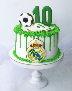 a soccer themed birthday cake with green icing