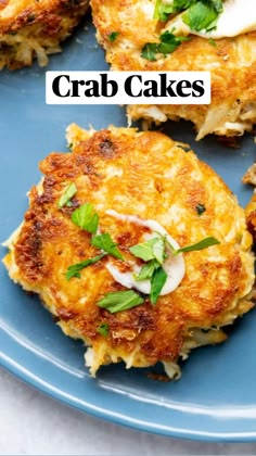 four crab cakes on a blue plate with parsley