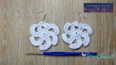 the crocheted earrings are ready to be made into something that looks like it is being worked on