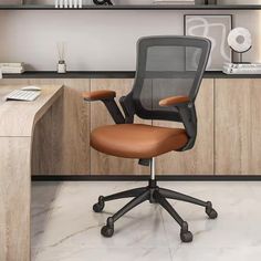 an office chair sitting in front of a desk