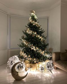 a decorated christmas tree in a living room