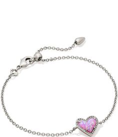 From Kendra Scott&#x2C; this bracelet features:Wear your heart on your wrist with the Ari Heart Chain Bracelet. This asymmetrical design shines solo&#x2C; but functions just as well as part of your everyday stack.Line braceletRhodium plated brassLobster clasp closure with sliding beadapprox. 0.56" x 0.3" station; 7.5" circumferenceImported.Please note: Due to the one-of-a-kind nature of the medium&#x2C; exa Heart Chain Bracelet, Kendra Scott Bracelet, Heart Bubbles, Bracelet Heart, Bubble Gum Pink, Heart Chain, Silver Chain Bracelet, Sandals For Sale, Asymmetrical Design