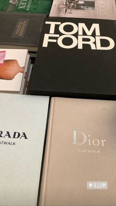 several books stacked on top of each other in front of a white background with the words tom ford