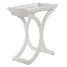 a white side table with a shelf on top