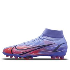 the nike superfly football shoe is shown in purple and red colors, with black lettering on