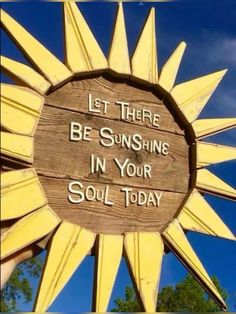 a wooden sign that says let there be sunshine in your soul today