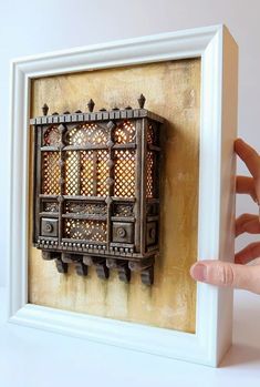 A Moroccan wooden balcony miniature with lights and a yellow wall Balcony With Lights, Moroccan Balcony, Wood Art Diy, Moroccan Art, Yellow Wall, Miniature Houses, Miniature Crafts, Miniature Model, Miniature Furniture