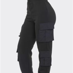 Beautiful Cargo Pants Can Be Dress Up Or Down. Very Comfortable Material. Black Cargo Pants With Elastic Waistband For Work, Workwear Black Cargo Pants With Elastic Waistband, Black Elastic Waistband Cargo Pants For Work, Black Utility Pants With Elastic Waistband, Black Cargo Style Joggers, Black Cargo Pants With Elastic Waistband, Black Cargo Style Sweatpants, Trendy Black Joggers With Pockets, Black Joggers With Pockets For Work