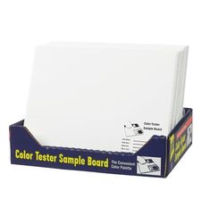 a box of color tester sample boards on a white background, with the package in front of it