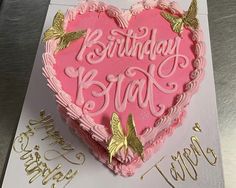 a heart shaped birthday cake on top of a card