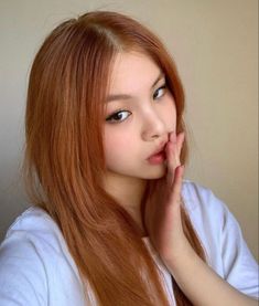 Asian With Ginger Hair Color, Milk Tea Ginger Hair, Asians With Orange Hair, Cooper Hair Color Asian, Orange Asian Hair, Kpop Ginger Hair, Ginger Hair On Asian Women, Dark Ginger Hair Asian, Korean Orange Hair