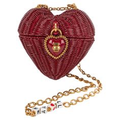 DOLCE & GABBANA - (Made in Italy) Red patent wicker heart bag, leather interior and gold-tone metal attributes. Spring-Summer 2018 collection. Condition: Very good condition Dimensions: Height : 20 cm - Length : 20 cm - Depth : 4 cm - Handle : 114 cm S244 Heart Shaped Purse, Beautiful Purses, Heart Shaped Bag, Micro Bags, Unique Handbags, Heart Padlocks, Designer Purses, Wicker Bags, Heart Box