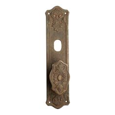 an antique door handle with ornate designs on it's side, isolated against a white background