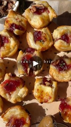 small pastries are arranged on a table