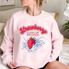 This soft sweatshirt has a loose fit for a comfortable feel. With durable print, it will be a walking billboard for years to come. .: 50% Cotton 50% Polyester .: Medium-heavy fabric (8.0 oz/yd² (271.25 g/m .: Loose fit .: Sewn in label .: Runs true to size Oversized Kawaii Hoodie Sweatshirt, Kawaii Hooded Sweatshirt With Graphic Print, Kawaii Streetwear Hoodie With Letter Print, Kawaii Long Sleeve Hoodie With Letter Print, Pink Kawaii Hoodie Sweatshirt, Pink Kawaii Sweatshirt, Oversized Harajuku Sweatshirt With Letter Print, Kawaii Oversized Hoodie Top, Kawaii Long Sleeve Sweatshirt For Streetwear