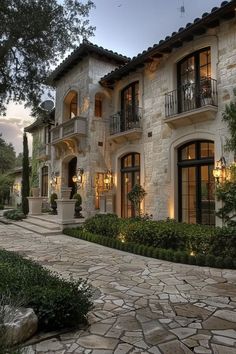 Elegant French chateau exterior with formal parterre garden French Styled Home Exterior, France House Design, French Country Side House, Cobblestone House Exterior, Country Style Homes Exterior, House Exterior European, Stone Homes Exterior, Tuscan Style Homes Exterior, French Homes Exterior