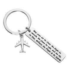 a key chain with an airplane on it