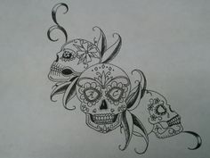 a drawing of two skulls with flowers on their heads