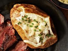 steak and potatoes in a cast iron skillet