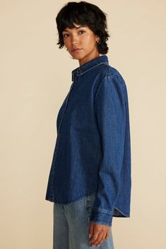 A quintessential denim shirt, Bixby has it all: classic styling, a casual and easy-care fabric, and subtle details that make it feel special. Wear it with everything.  DESIGN- Classic fit. Choose your usual size.- Traditional long sleeve shirt with a spread collar, exposed front placket, and buttons at the collar and cuffs.- Urea buttons- Length: 25 1/2"- Part of a matching setFABRIC & CARE- 100% organic cotton denim- Ethically made in China.- Machine wash cold.SUSTAINABILITY- This product was c Classic Collared Denim Top For Fall, Classic Medium Wash Shirt For Work, Classic Relaxed Fit Denim Top, Classic Cotton Denim Blue Top, Classic Denim Blue Cotton Top, Classic Cotton Denim Top For Fall, Unstructured Chambray Tops For Everyday, Classic Relaxed Fit Medium Wash Denim Top, Everyday Collared Top In Denim Blue