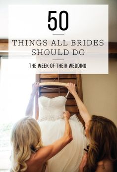 two women are trying on a wedding dress in front of a window with the words 50 things all brides should do