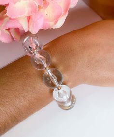 Introducing our Clear as Day Acrylic Ball Elastic Bracelet, a charming and versatile accessory that effortlessly adds a touch of contemporary elegance to any ensemble. This bracelet features a series of clear acrylic balls, creating a captivating visual effect that is both modern and chic. Elastic Bracelet, Visual Effects, A Series, Clear Acrylic, Elastic, Bracelet