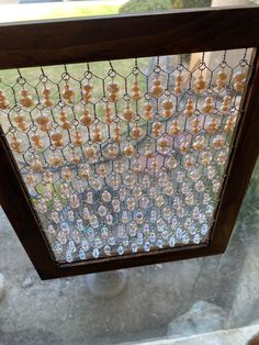 a window that has some beads on it