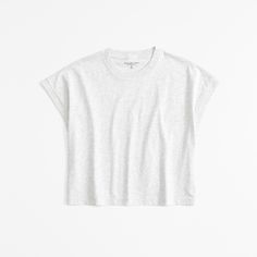 Elevate your casual wardrobe with the Abercrombie & Fitch Women's Premium Polished Dolman Tee. This light gray top is crafted from high-quality cotton and features a biopolish finish for a supremely soft and crisp feel. Perfect for a relaxed yet stylish look, it offers a slightly cropped length and a comfortable, easy fit.

- Size: Medium
- Color: Light Gray
- Material: Cotton
- Gender: Female
- Features: Relaxed-fit silhouette, crew neckline, straight hem, short sleeves

Ideal for pairing with Everyday Boxy Fit Short Sleeve Tops, Spring Relaxed Fit Muscle Tee With Short Sleeves, Boxy Short Sleeve Tops For Everyday, High School Fits, Female Features, Cozy Evening, Dream Closets, Gray Top, I Love Fashion