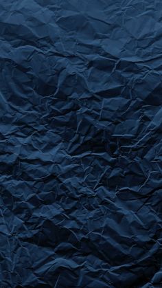 an image of blue crumpled paper background