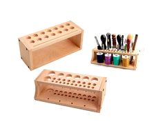 two wooden boxes with different types of crafting supplies